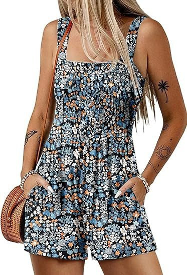 Dame jumpsuit med blomster mønster og praktiske lommer Stilla
