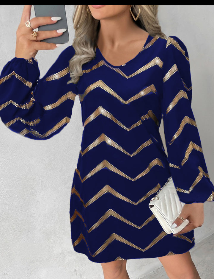 Dame stilfuld mini-kjole med skinnende zigzag-mønstre og puffærmer Stilla