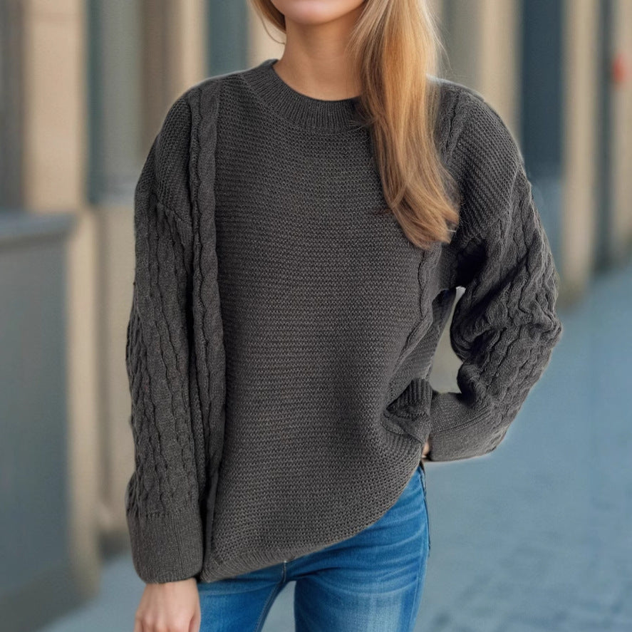 Kvinders chunky striktrøje med kabeldesign og voluminøse ærmer Stilla