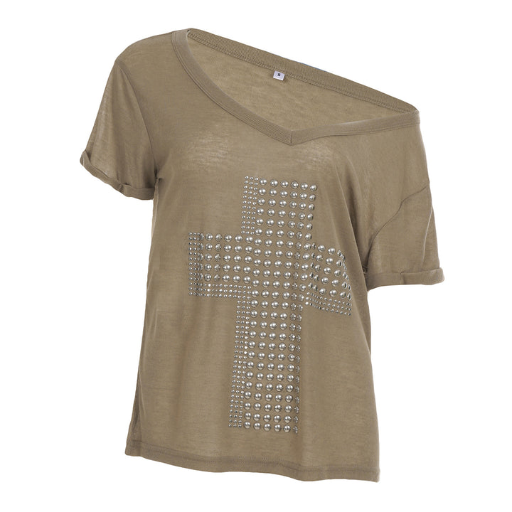 Dame stilfuld oversized T-shirt med kors-print og glimmerdetaljer Skovae