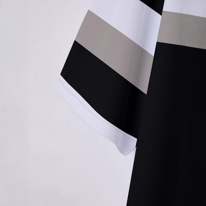 Herre poloshirt med moderne blokstribemønster Stilla