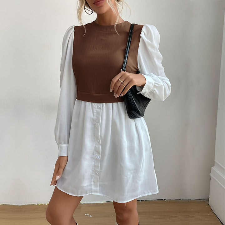 Dame mode skjortekjole med elegante puffærmer og knapbar front Stilla