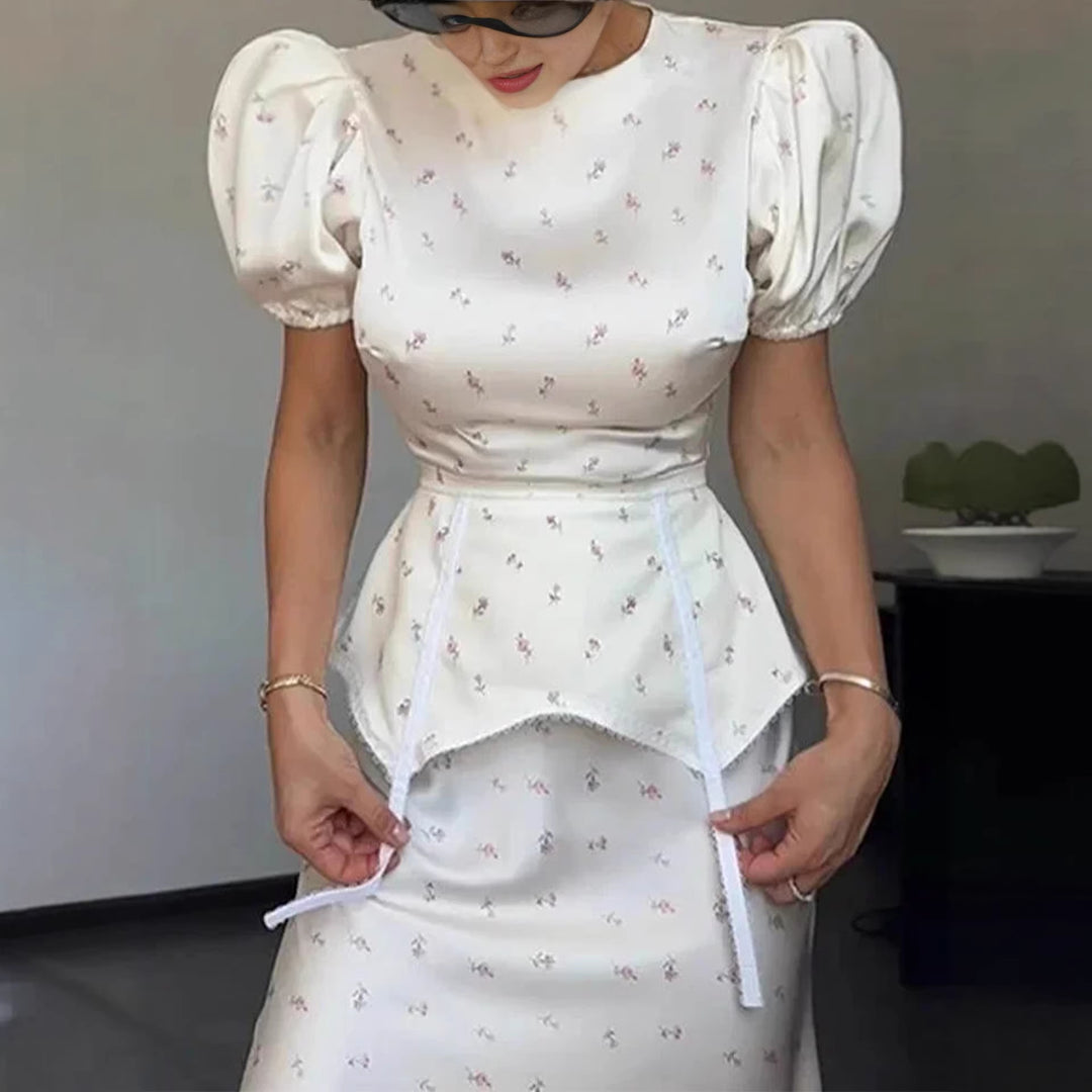 Dame elegant top med ballonærmer og legende detalje på taljen