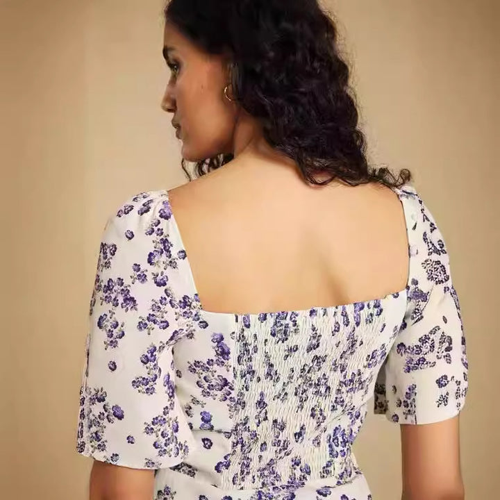 Dame bomuldsbluse med blomstermotiv og romantiske flæse detaljer Stilla