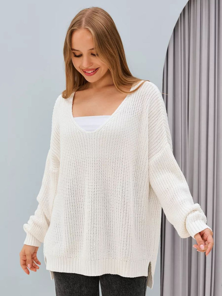 Dame Oversized Strikbluse med asymmetrisk udskæring og brede ribstrikdetaljer Stilla