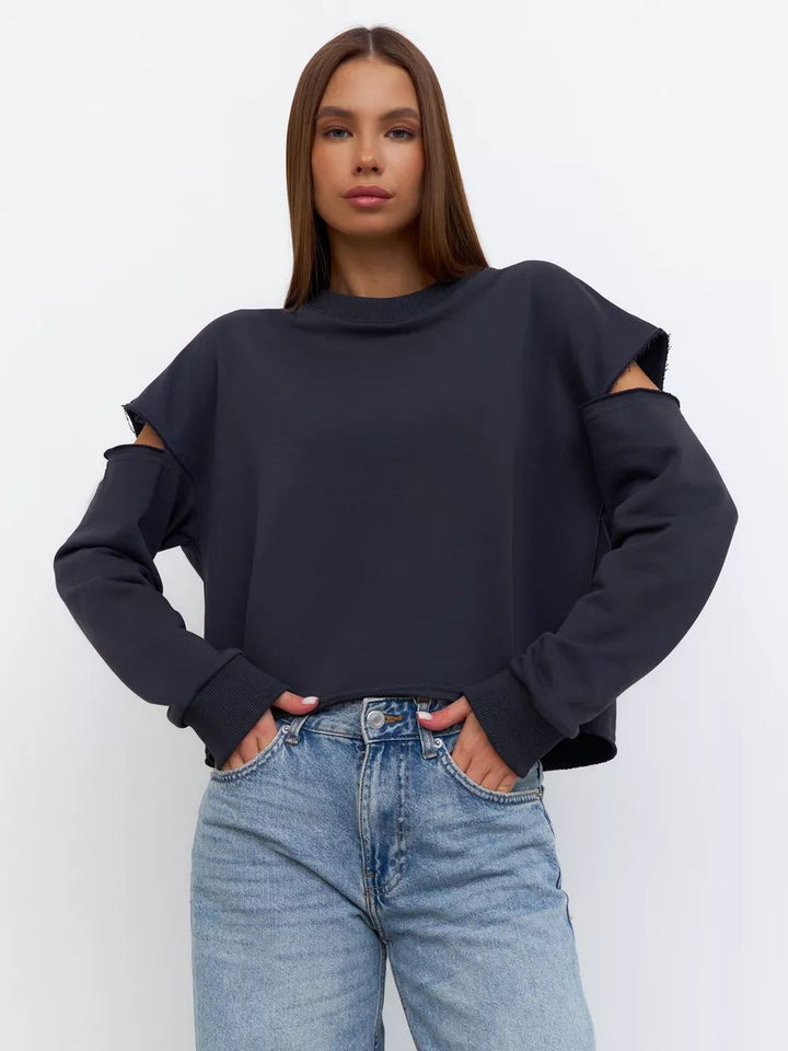 Dame afslappet sweatshirt med asymmetrisk cut-out-detaljer og oversized snit Stilla