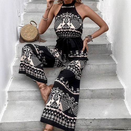 Dame jumpsuit med elegant halterdesign og stilfulde mønsterdetaljer Skovae