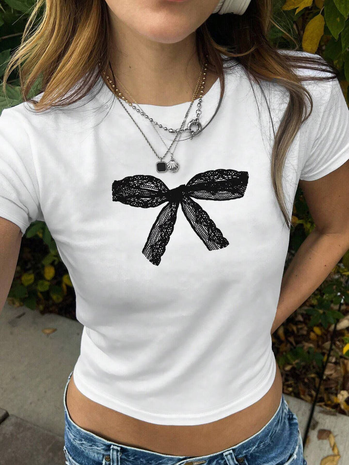 Dame T-shirt med legende kattemotiv og sarte vinger Skovae