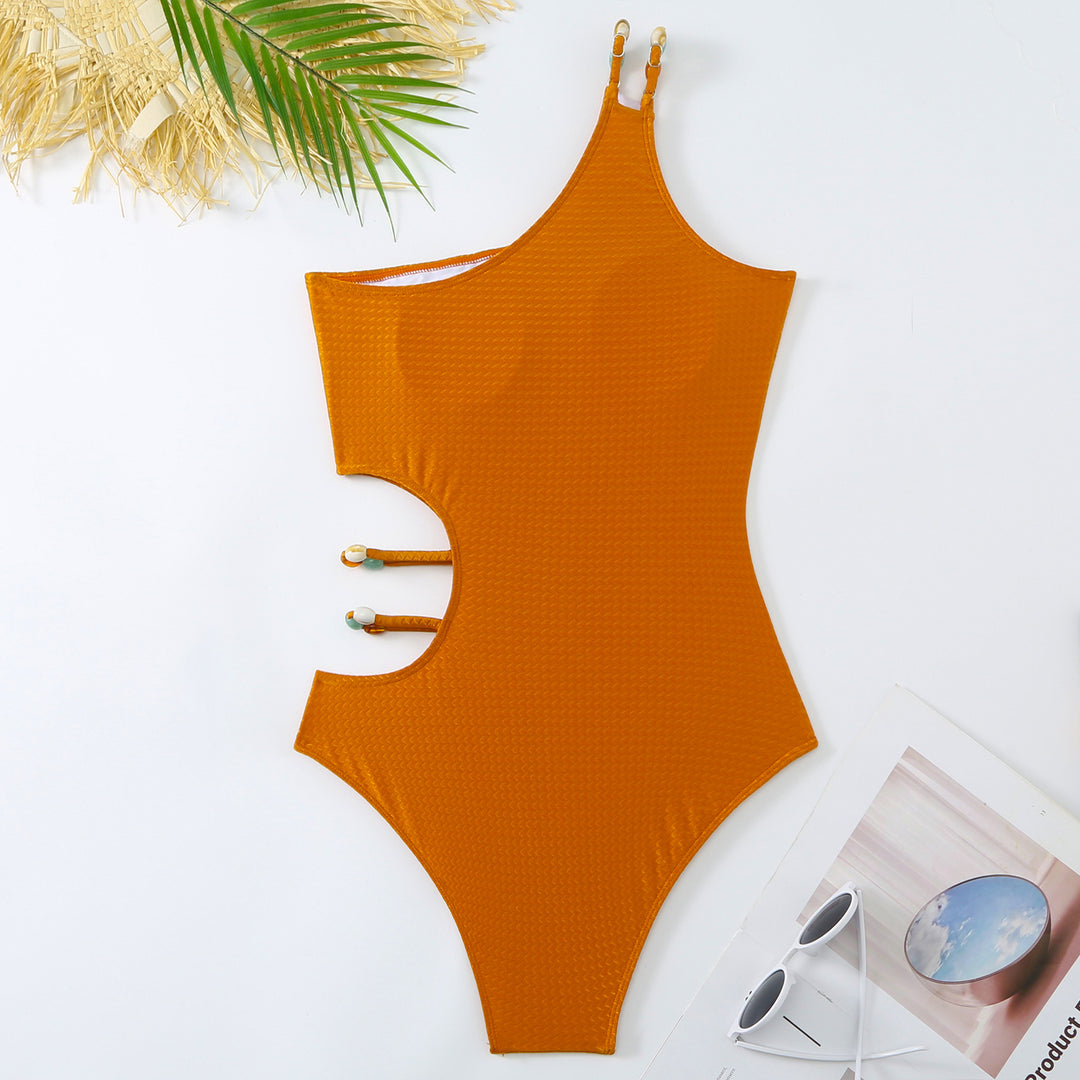 Dame Énteiler Badedragt med trendy Cut-Outs og matchende Indpakningsnederdel Stilla