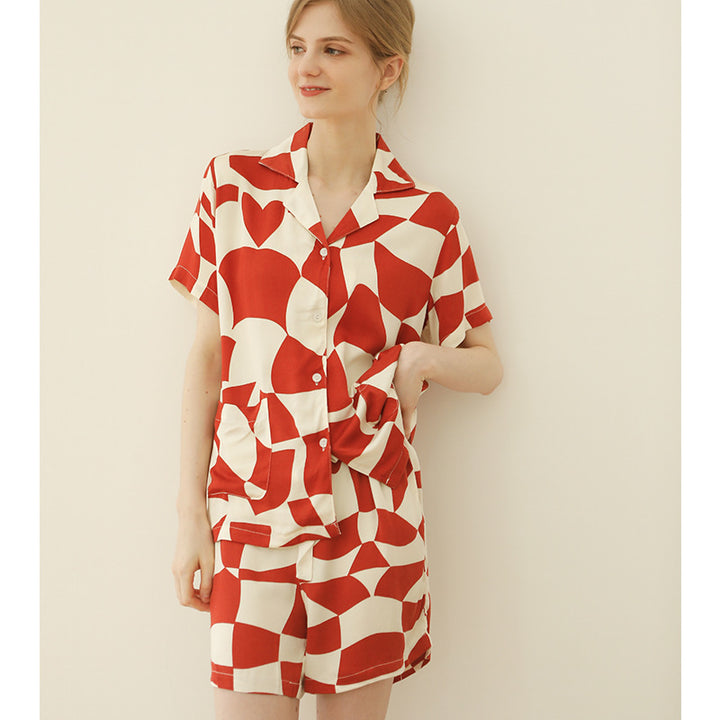 Dame Pyjamasæt med legende geometrisk design og praktiske lommer Stilla