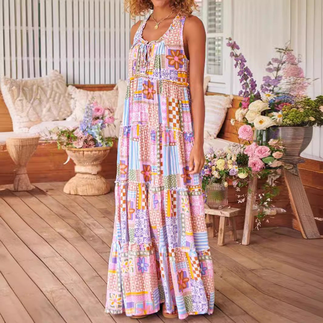 Dame maxikjole med farverigt patchwork-design og flæser Stilla