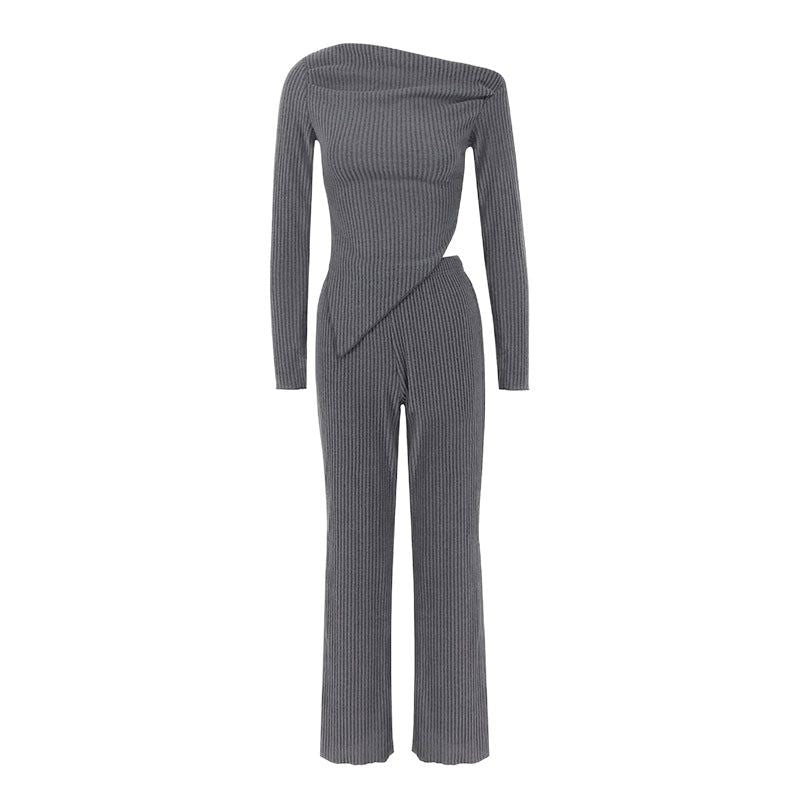Dame tætsiddende jumpsuit med asymmetrisk udskæring og lange ærmer Skovae