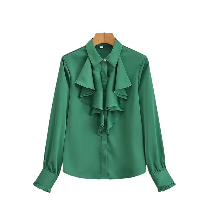 Damebluse med voluminøse flæser og elegant snit Stilla