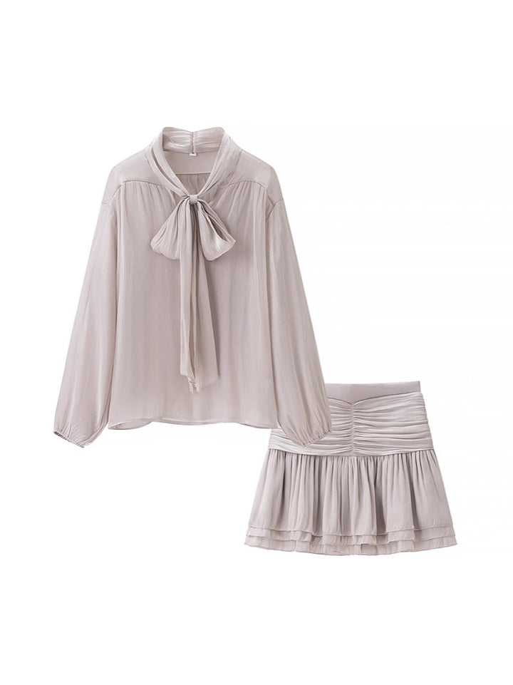 Dame bluse- og nederdelssæt med elegante flæsedetaljer Stilla