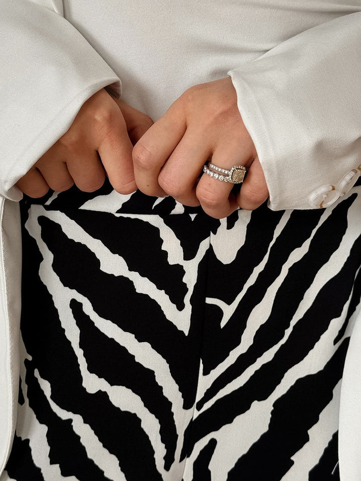 Dame bred Zebra-print Palazzo-bukser med elastisk talje og elegant snit Stilla