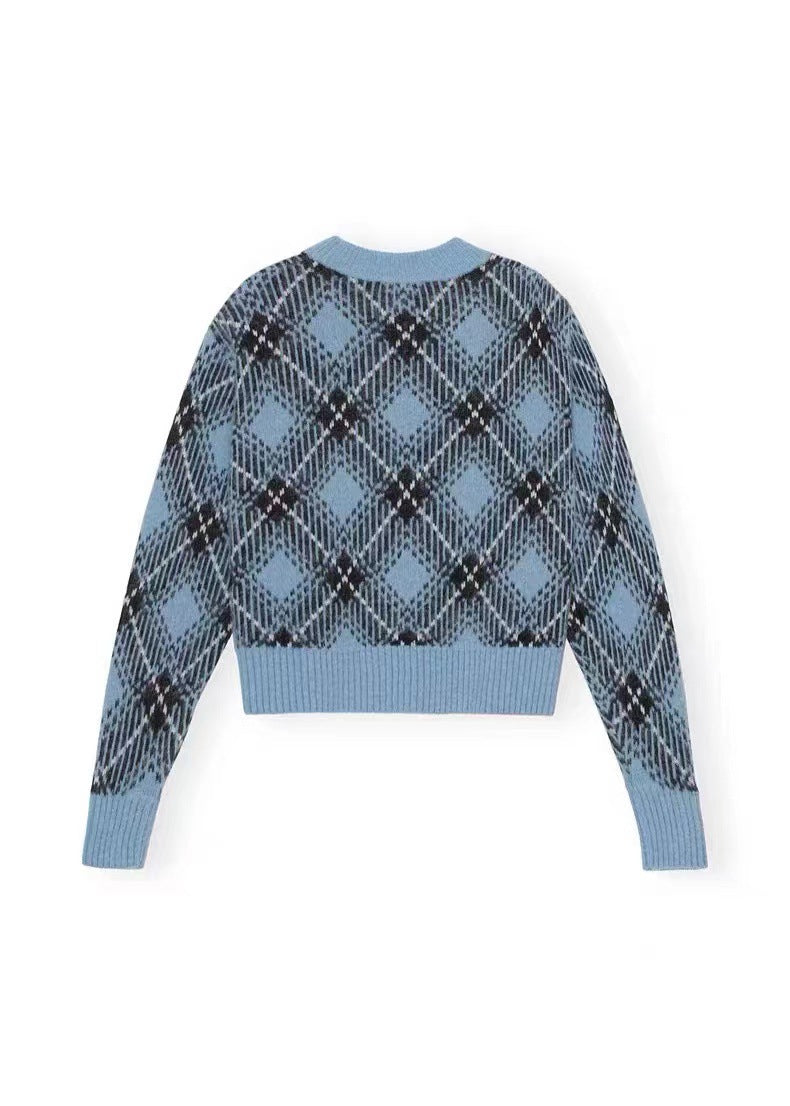 Dame sweater med stilfuldt ternet mønster og afslappet snit Stilla