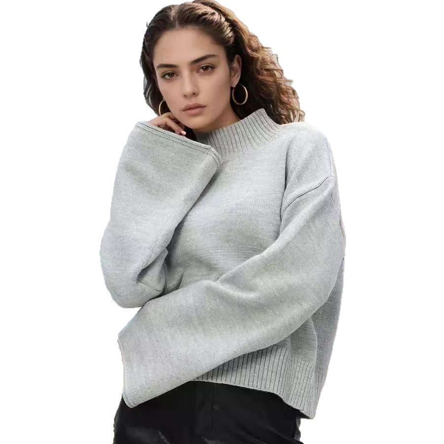 Kvindernes chunky strikket sweater med stående krave og voluminøse ærmer Stilla