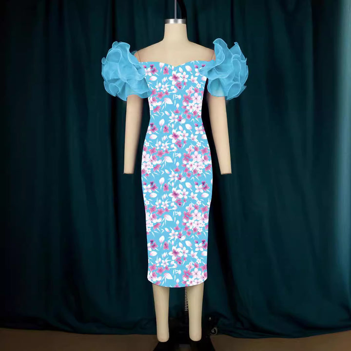 Dame Elegante Midi-Kjole med innovative puffærmer og kunstnerisk tryk Skovae