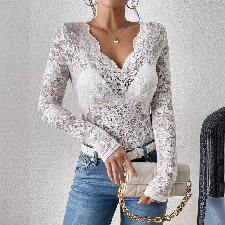 Dame elegant spidsbluse med dyb V-hals og lange ærmer Stilla