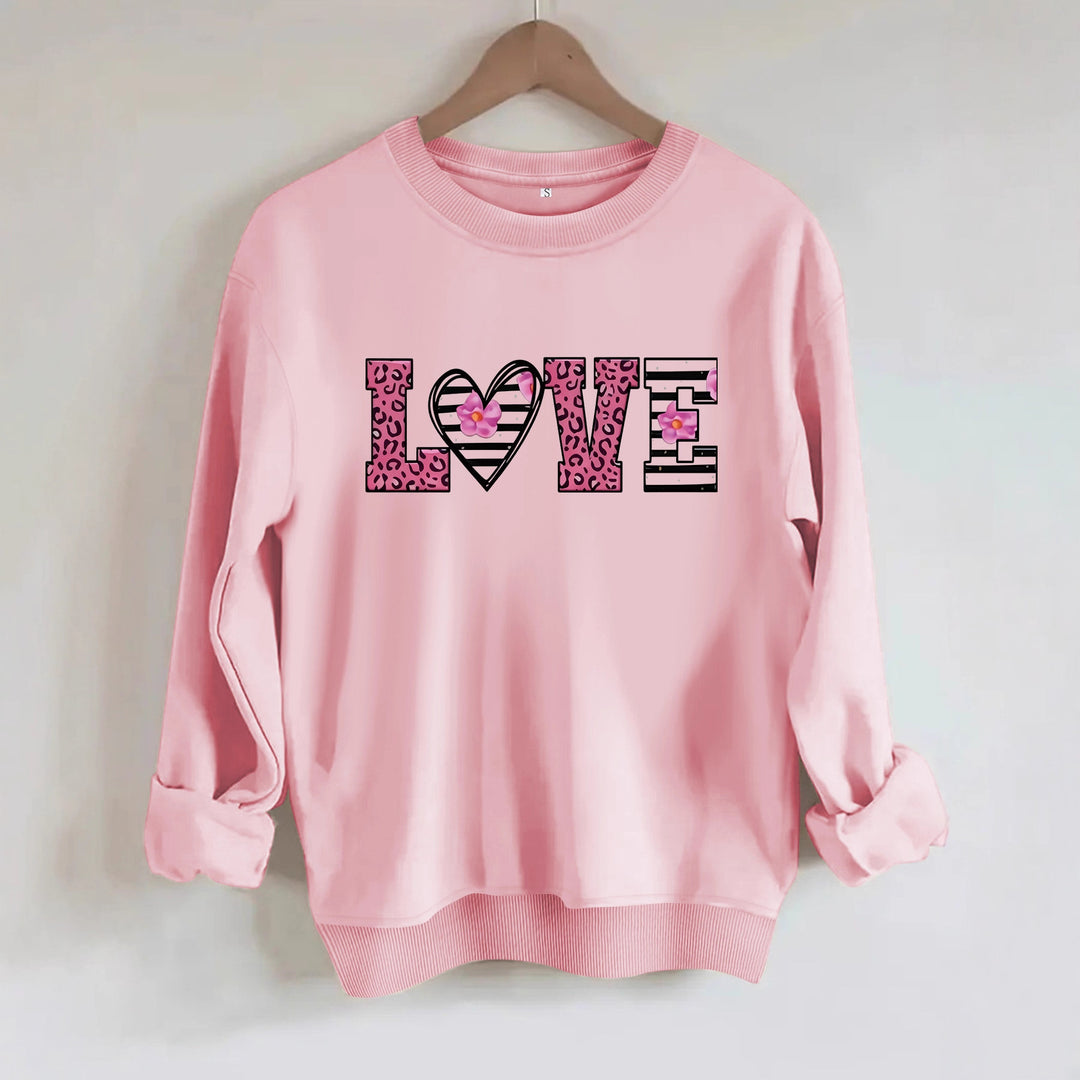 Kvinders sweatshirt med moderne leopard hjerte design og behagelig pasform Stilla