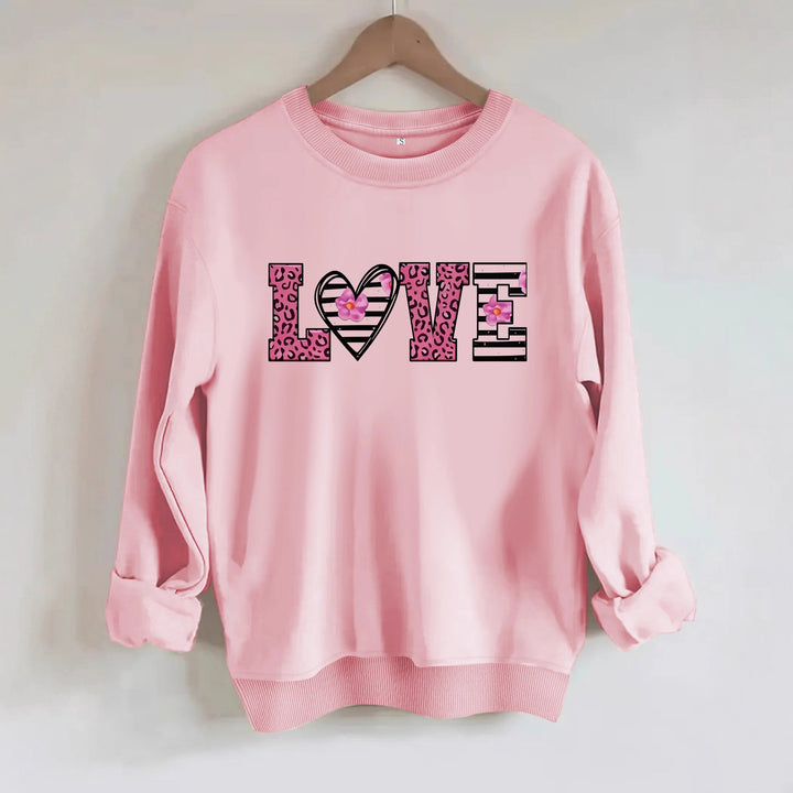 Kvinders sweatshirt med moderne leopard hjerte design og behagelig pasform Stilla