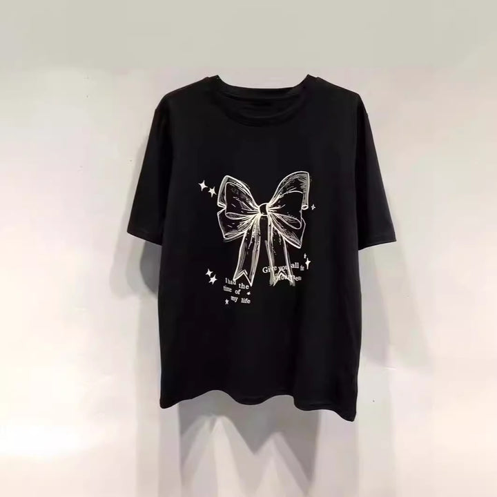 Dame T-shirt med legende båndmotiv og inspirerende slogan Stilla