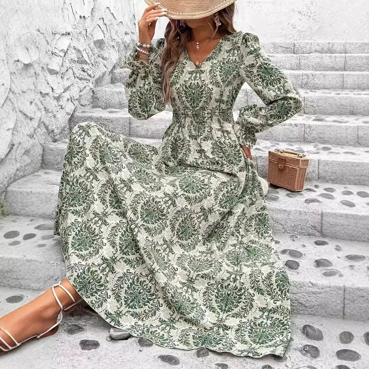 Dame Maxikjole med floralt design og vidde skørt Stilla