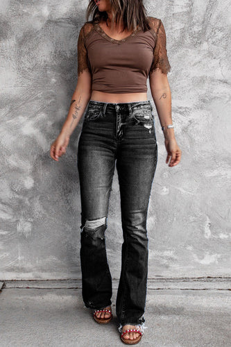 Dame brede flared jeans med moderigtige destroyed-look og høj talje Stilla