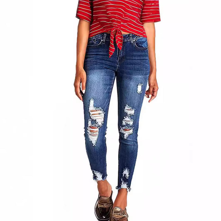 Dame Skinny Jeans med modetrend Destroyed-effekt og figurskærende snit Stilla