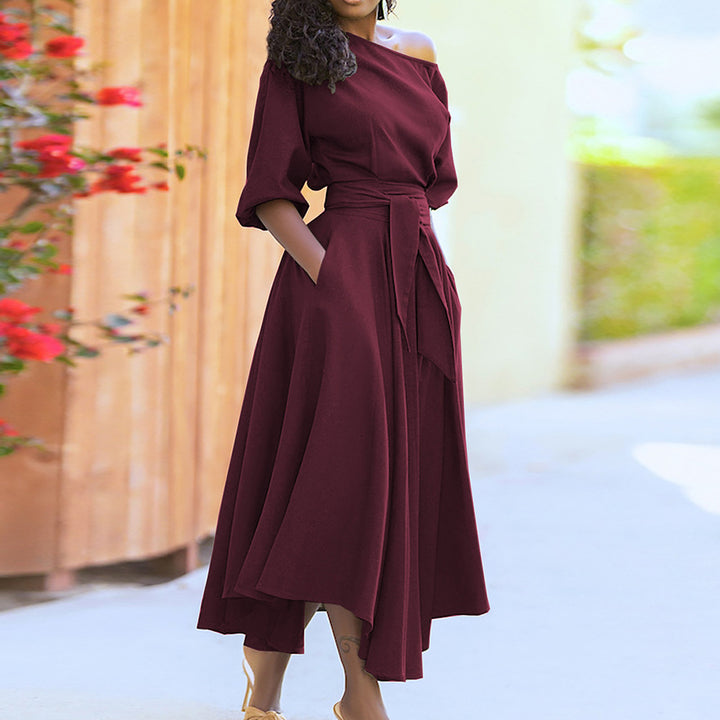 Kvinders elegante maxi kjole med off-shoulder design og bælte Stilla