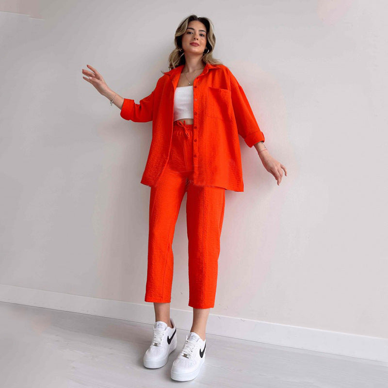 Dame fritids-to-dels sæt i let linned med cropped top og bred bukser Stilla