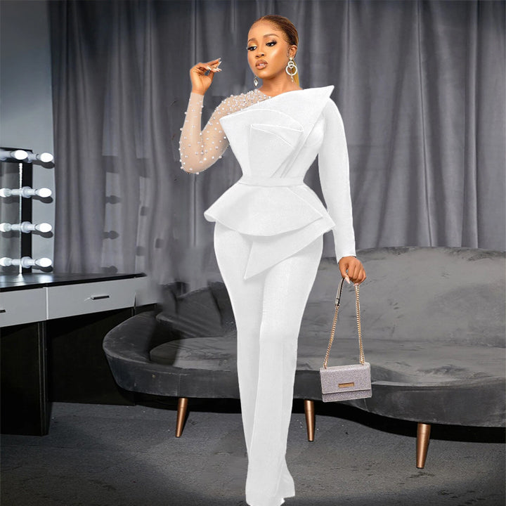 Dame elegant jumpsuit med asymmetrisk overdel og raffineret ruffles design Skovae