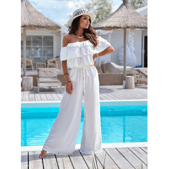 Dame elegant jumpsuit med off-shoulder udskæring og flydende snit Stilla