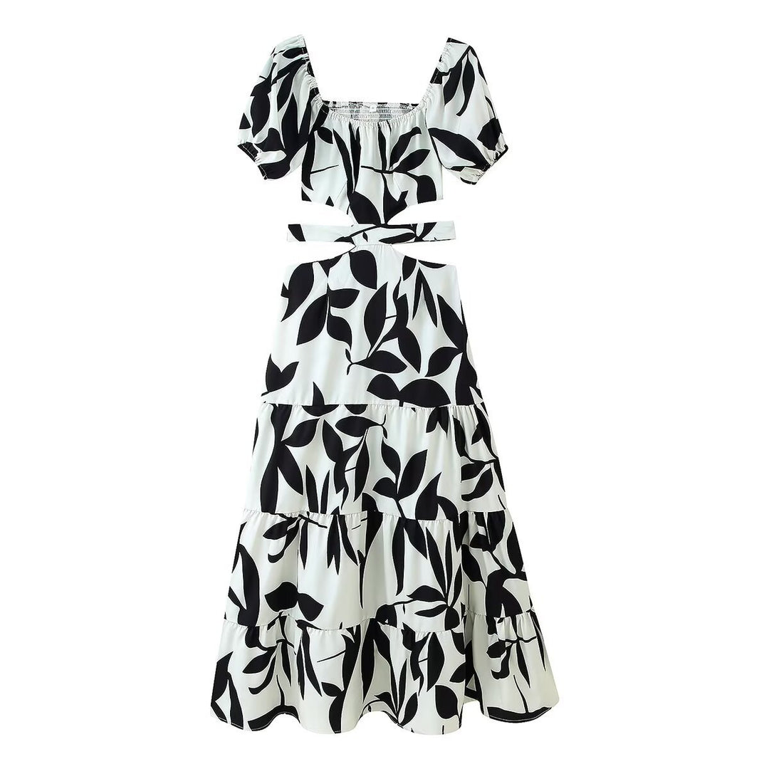 Femme Off-Shoulder Floral Maxi Kjole med lagdelt design Stilla