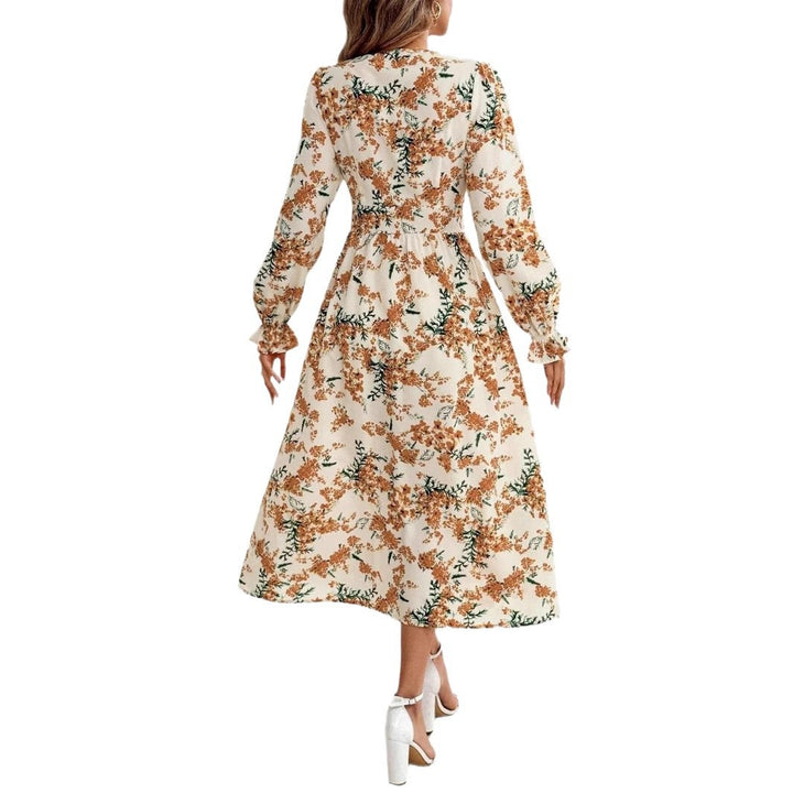 Dame Maxikjole med florale accenter og elegant slids Stilla