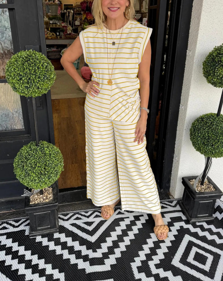 Dame stribet jumpsuit med bred ben og ærmeløst design Stilla