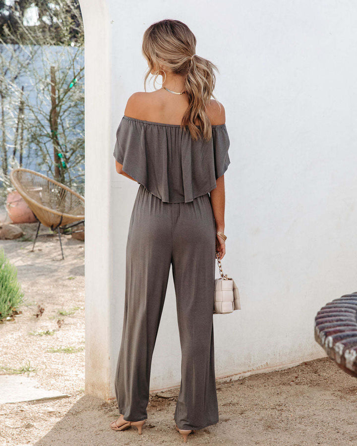 Dame luftigt jumpsuit med off-shoulder-detalje og vid ben Stilla
