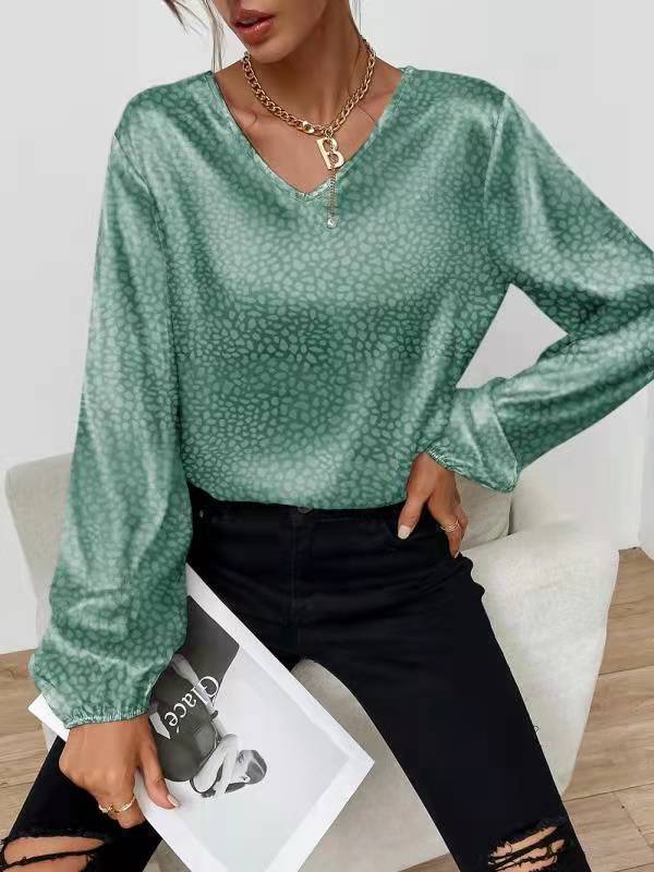 Kvinders elegante bluse top med V-hals og voluminøse ærmer Stilla