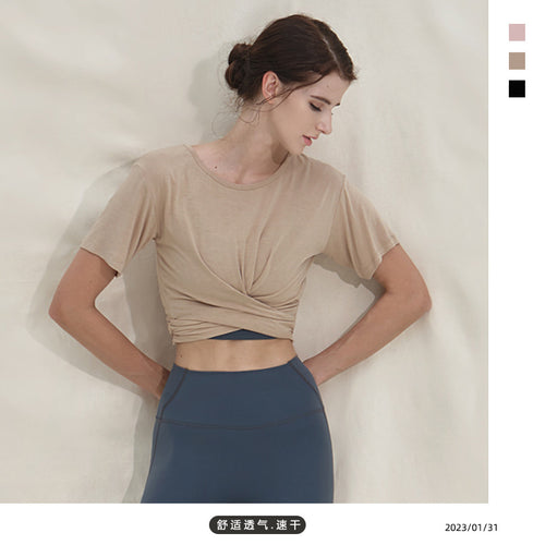 Dame sporty kortærmet T-shirt med trendy vikledetalje og elastisk kant Stilla