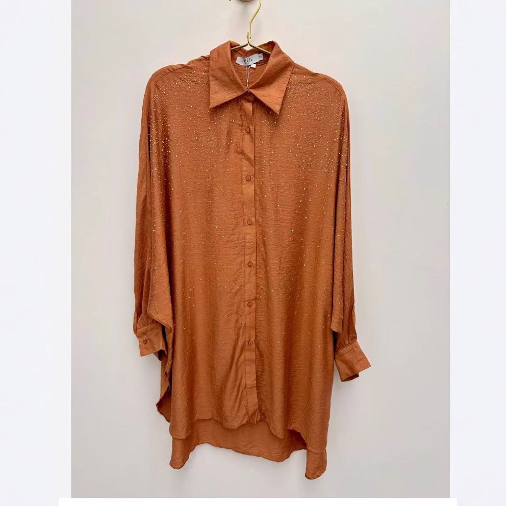 Damebluse med glitrende detaljer og afslappet pasform Stilla