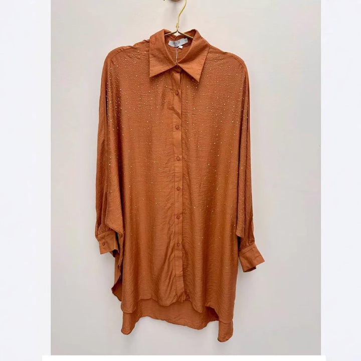 Damebluse med glitrende detaljer og afslappet pasform Stilla