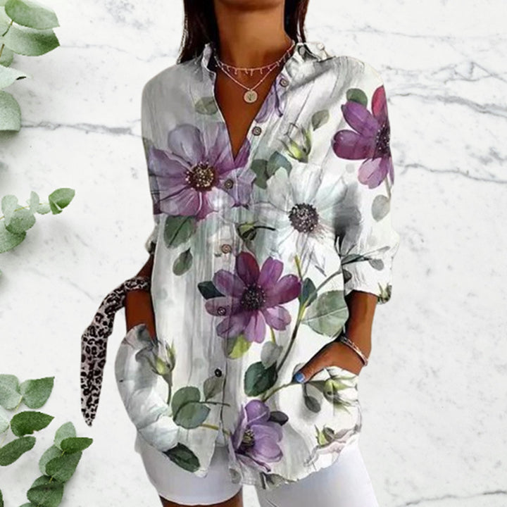 Damebluse med blomsterdesign og praktiske lommer Stilla