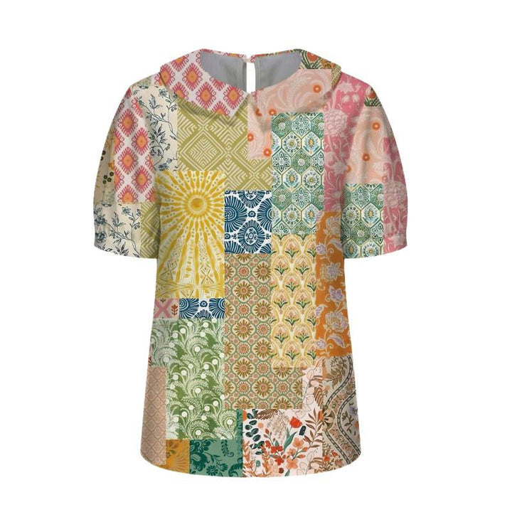 Dame kortærmet bluse med florale accenter og klassisk krave Skovae