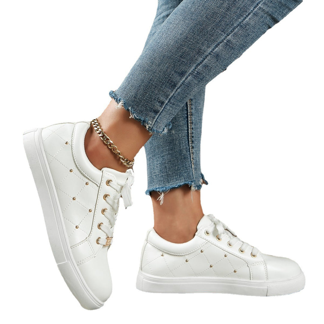 Dame Sportliche Fritids-sneakers med fashionable metalakcenter Stilla
