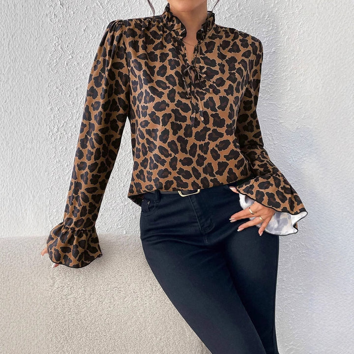 Damebluse med voluminøse ærmer og kreativ leopardmønster Stilla