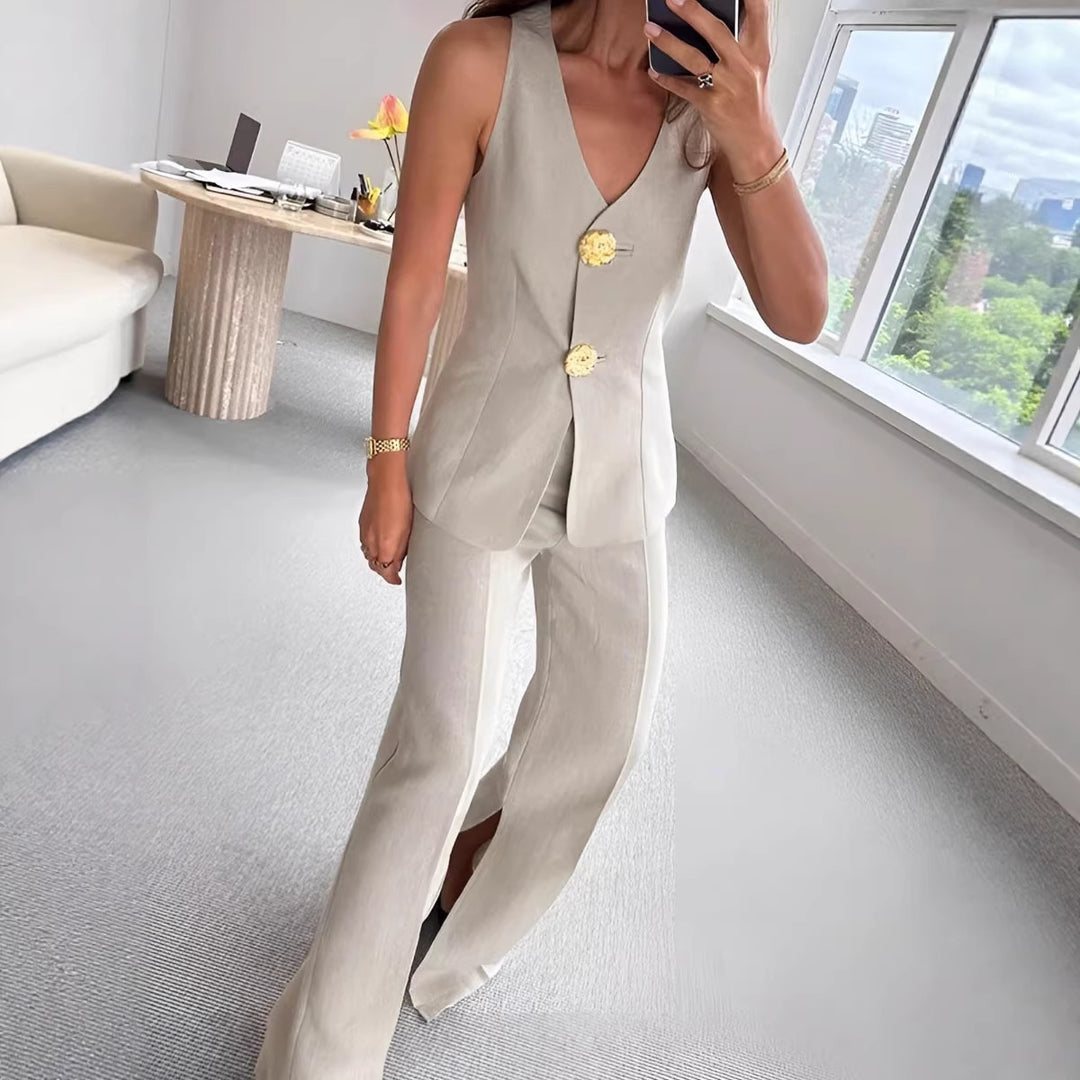 Dame elegant jumpsuit med front knaplukning og bred ben Skovae