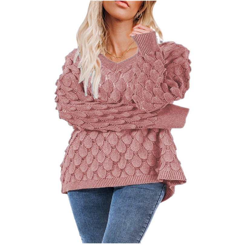 Kvinders chunky strikket sweater med skulpturel bølgemønster og V-hals Stilla