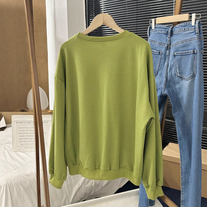 Kvindernes afslappede sweatshirt med iøjnefaldende bogstaver Stilla