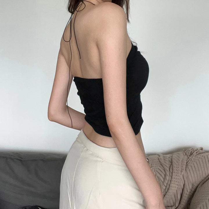 Dame Top med asymmetrisk snit og elegant snøre detaljer Stilla