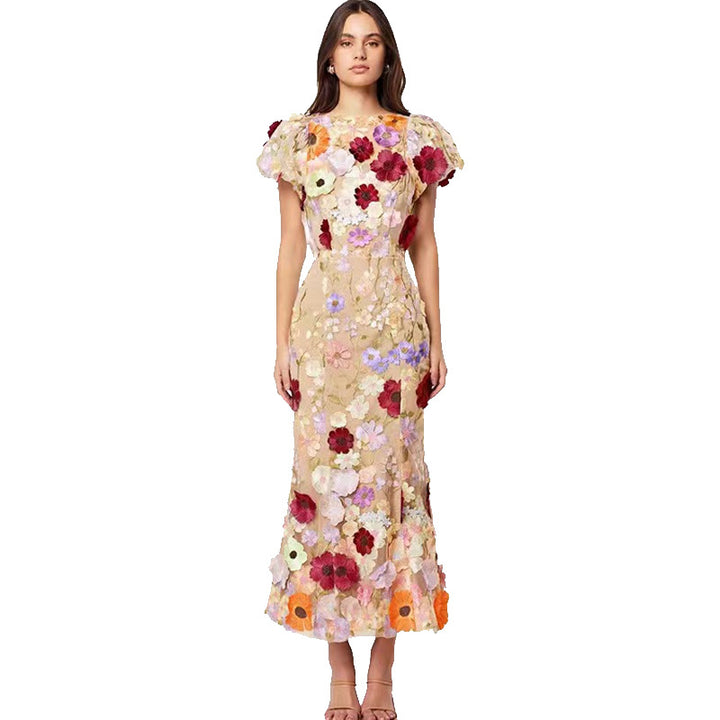 Dame Elegant blomsterkjole med transparent tyl og voluminøse pufærmer Stilla